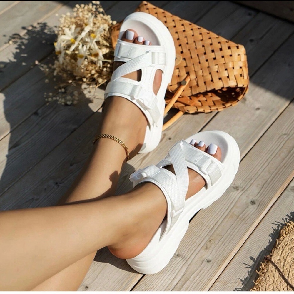 Ladies fashion wedge platform slides.